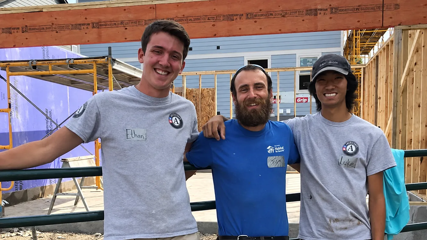 Ethan and his Habitat for Humanity AmeriCorps coworkers at a construction site